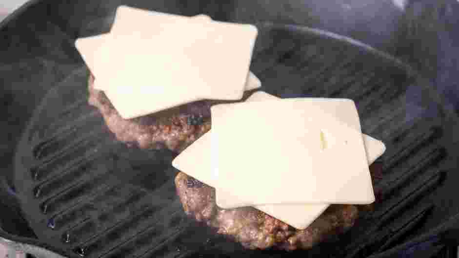 Mushroom Swiss Burger Recipe: Top with a slice of swiss cheese and allow it to melt while the patties are cooking.