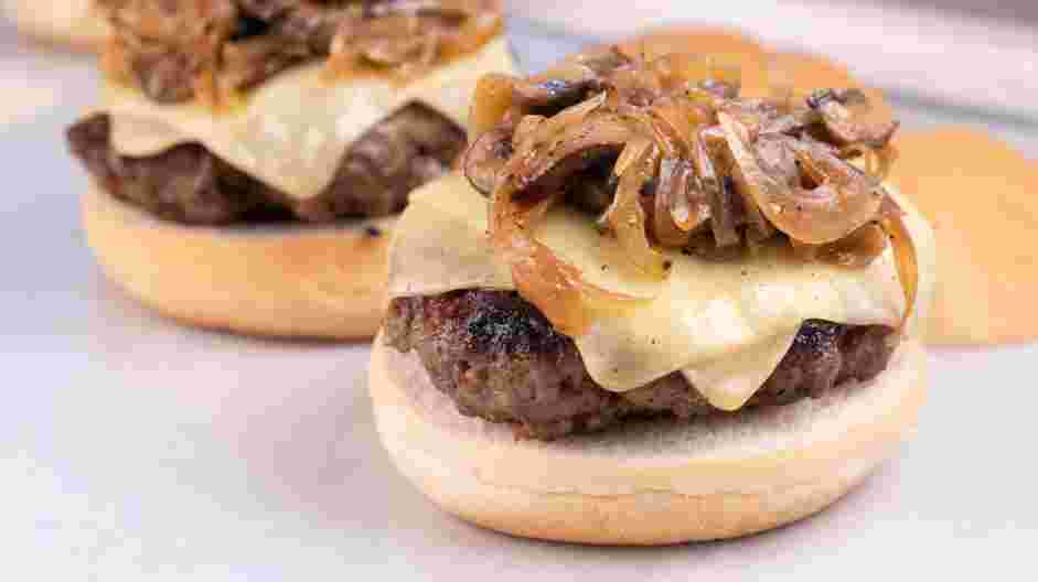 Mushroom Swiss Burger Recipe: Remove the burger from the grill and place each one of them on a brioche bun.