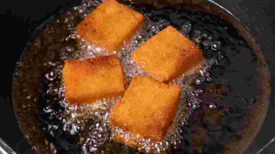 Shrimp Toast Recipe: Fry the shrimp toast in batches until golden brown on both sides, about 10 minutes.