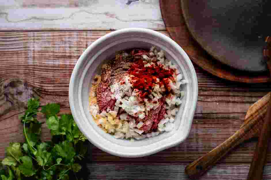 Mexican Meatball Soup (Albondigas) Recipe: Make the meatballs.