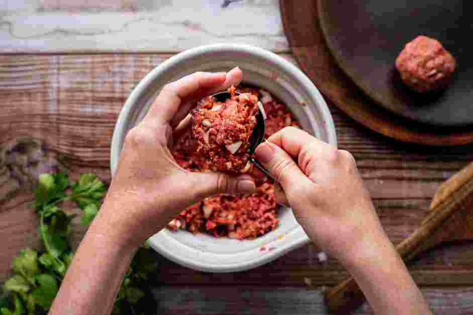 Mexican Meatball Soup (Albondigas) Recipe: Use a &frac14; cup measuring cup to portion the meatballs.