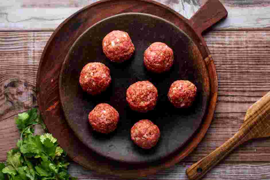 Mexican Meatball Soup (Albondigas) Recipe: Roll the portioned meatballs into spheres.