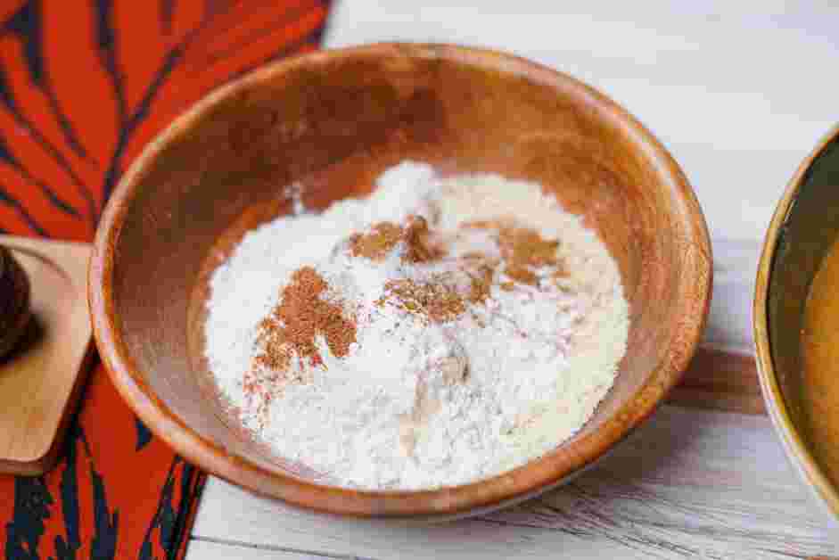 Sweet Potato Pancakes Recipe: In a medium mixing bowl, whisk together the ground pecans, all-purpose flour, baking powder, ground cinnamon, ground nutmeg and salt.