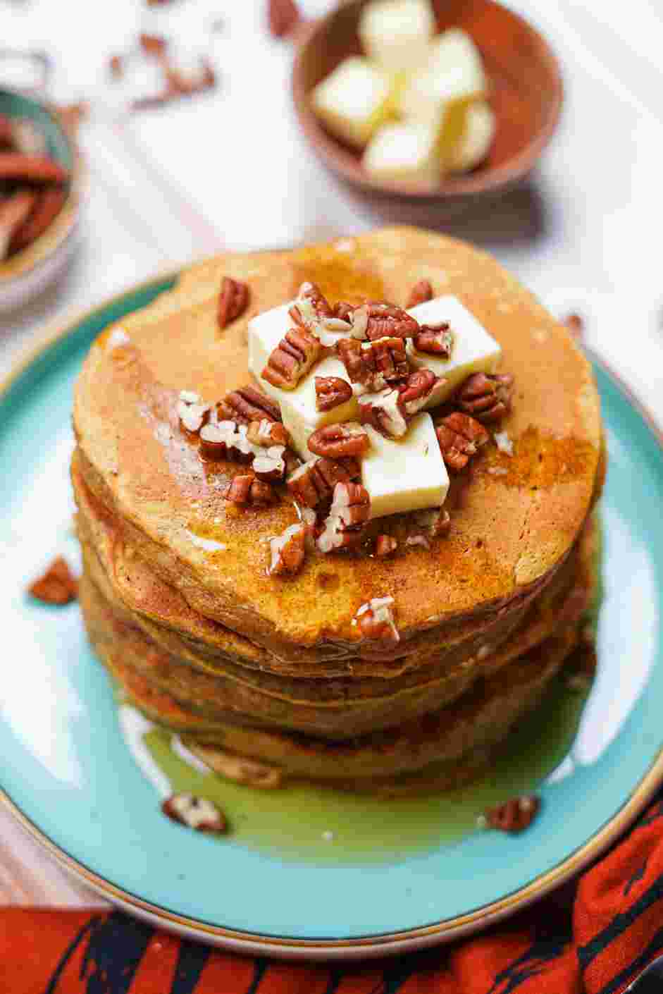 Sweet Potato Pancakes Recipe: Serve immediately topped with butter, chopped pecans or walnuts and maple syrup.