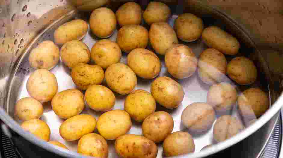 Deep Fried Potatoes (Sindhi Tuk Aloo) Recipe: Place the potatoes in a pot and fill with enough water to cover the potatoes.