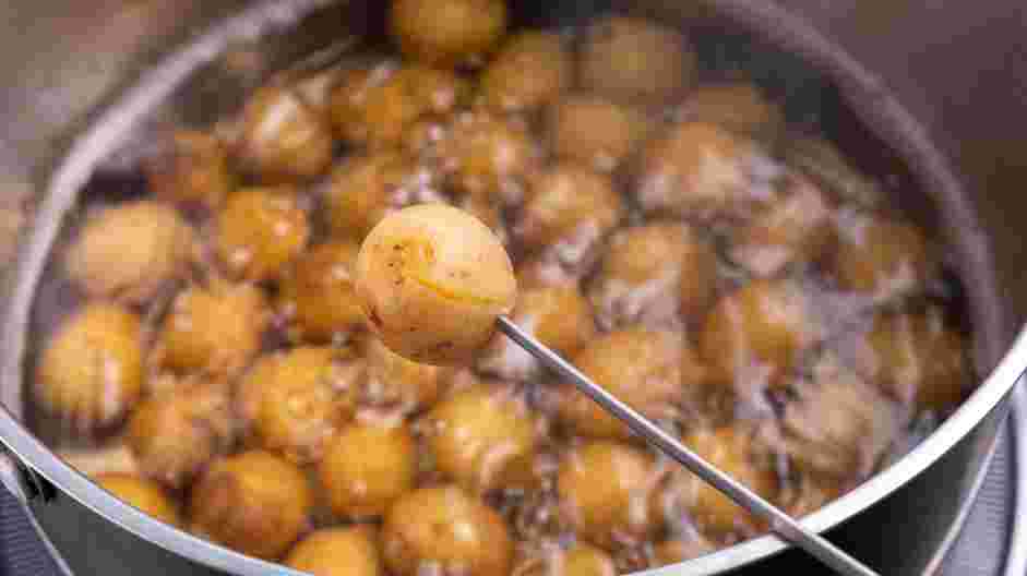 Deep Fried Potatoes (Sindhi Tuk Aloo) Recipe: Bring the water to a boil and boil the potatoes until tender.