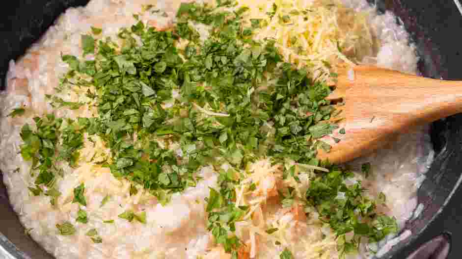 Seafood Risotto Recipe: Stir in the Parmesan cheese and parsley, just until well incorporated and smooth.