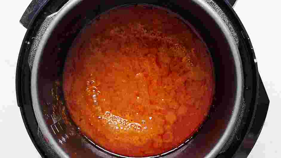 Instant Pot Chicken Tacos Recipe: While you shred (or chop) the chicken breasts, set the Instant Pot to the sauté function on low temperature and simmer the sauce to thicken, stirring occasionally to prevent the sauce from burning.