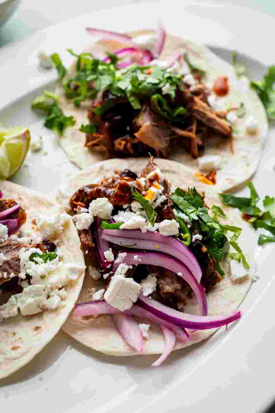 Brisket Tacos Recipe: Pour the reserved sauce from the pan before on top of the taco and enjoy!