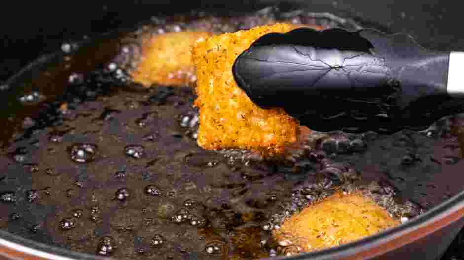 Fried Ravioli Recipe: Fill a cast-iron skillet or a deep saute pan with 3-4 inches of oil.