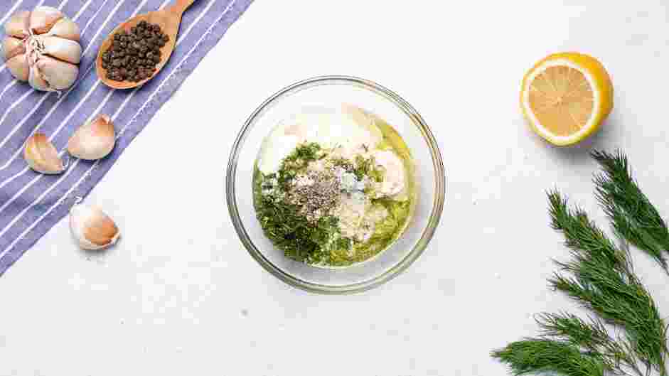 Vegan Tzatziki Recipe: In a small bowl, whisk together the plant-based yogurt, minced garlic, chopped dill, extra-virgin olive oil, lemon juice, salt and pepper until combined.