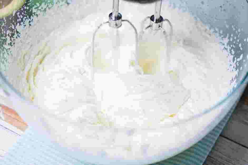 Avocado Ice Cream Recipe: In a mixing bowl with an electric mixer, beat the heavy cream until stiff peaks form.