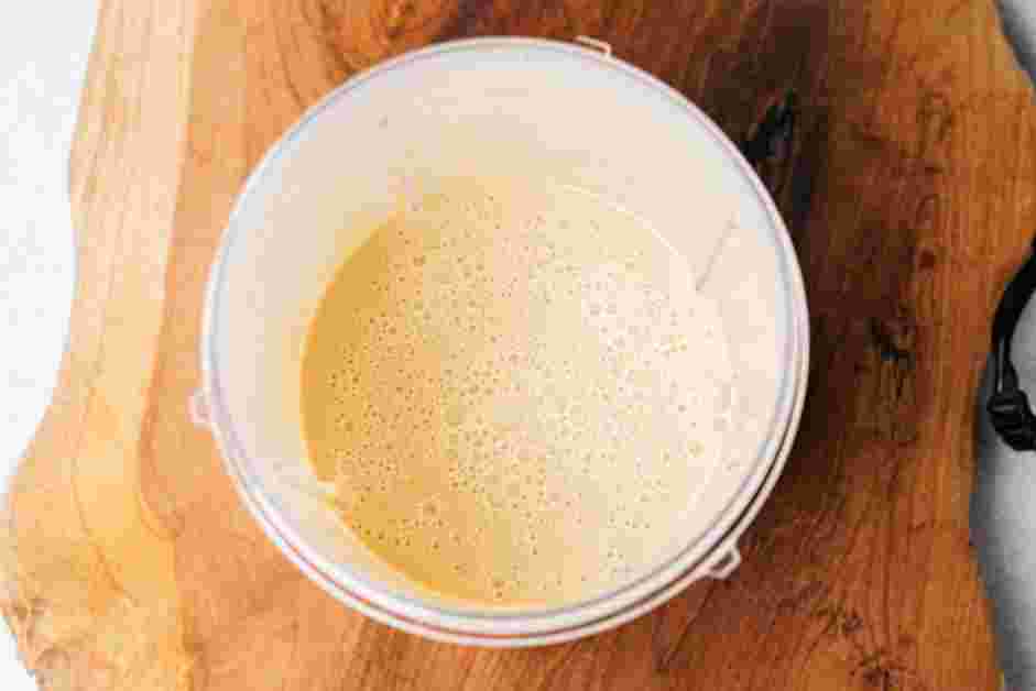 Date Shake Recipe: Add the vanilla ice cream and pulse to blend until thick and creamy.
