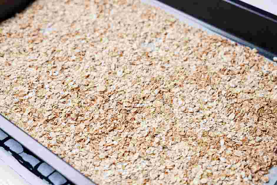 Granola Butter Recipe: Spread the oats in an even layer on the prepared sheet pan and bake, stirring occasionally, until lightly toasted, about 10 minutes.