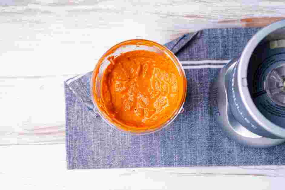 Spicy Marinara Sauce Recipe: Add the cold butter to the marinara sauce and blend for 30 seconds.