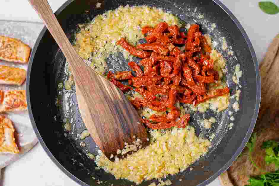 Tuscan Salmon Recipe: Add the sundried tomatoes and fry for 1-2 minutes.