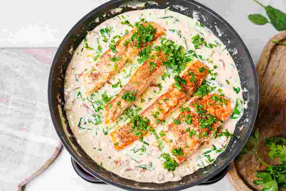 Tuscan Salmon Recipe: Add the salmon back to the pan.