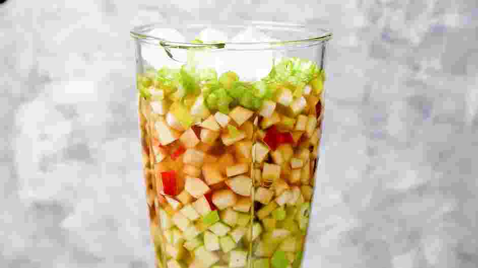 Apple Smoothie Recipe: In the jar of a large blender, add the chopped Granny Smith apples, red apples, pear, celery, pear juice and ice, if using.