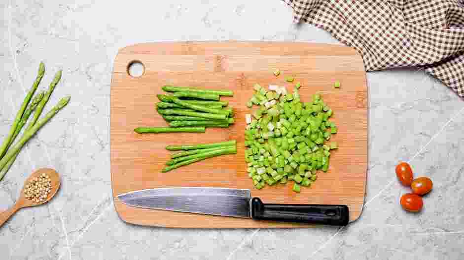 Asparagus Stuffed Chicken Recipe: Cut the asparagus stems into small dice, keeping the 2-inch tips of the asparagus intact.