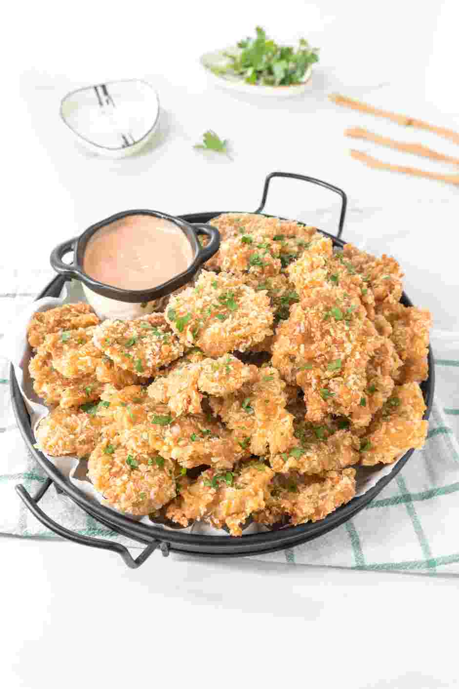 Fried Oyster Mushrooms Recipe: Garnish with fresh parsley and serve with your favorite dipping sauce.