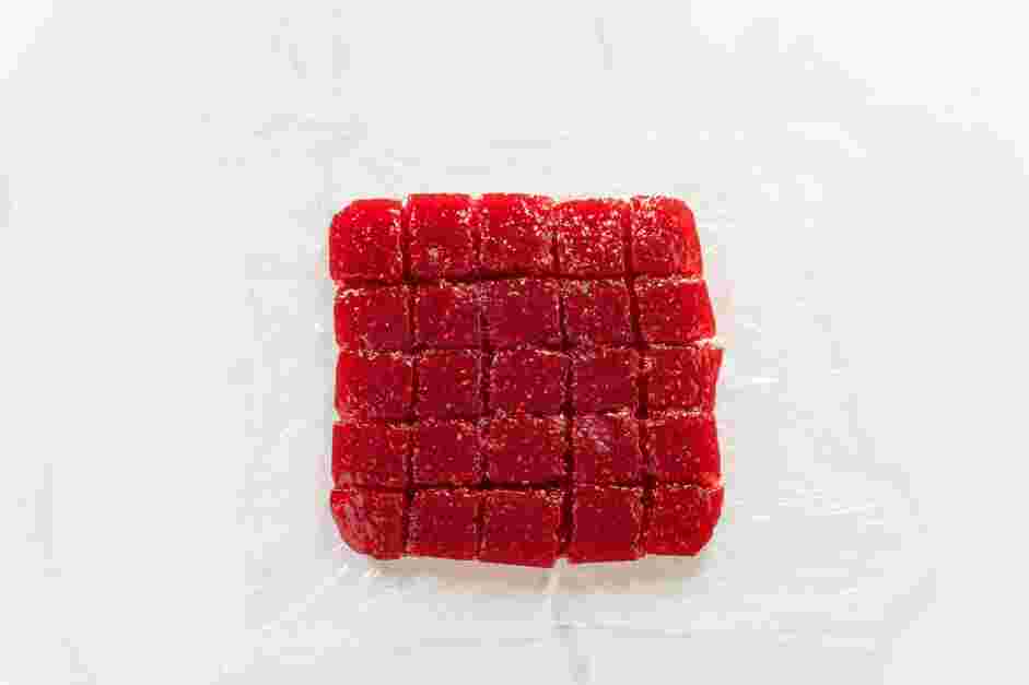 Strawberry Delight Recipe: When the strawberry delight is fully set, cut the strawberry delight into cubes with an oiled knife.