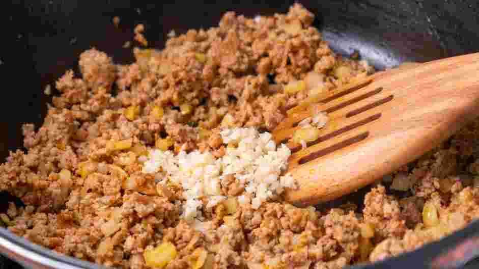 Totchos Recipe: Add the minced garlic and cook until fragrant, less than 1 minute.