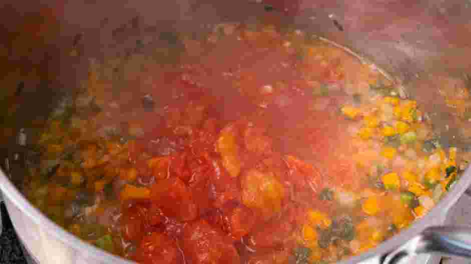 Turkey Bolognese Recipe: Add the chopped tomatoes to the pot and stir until well combined.