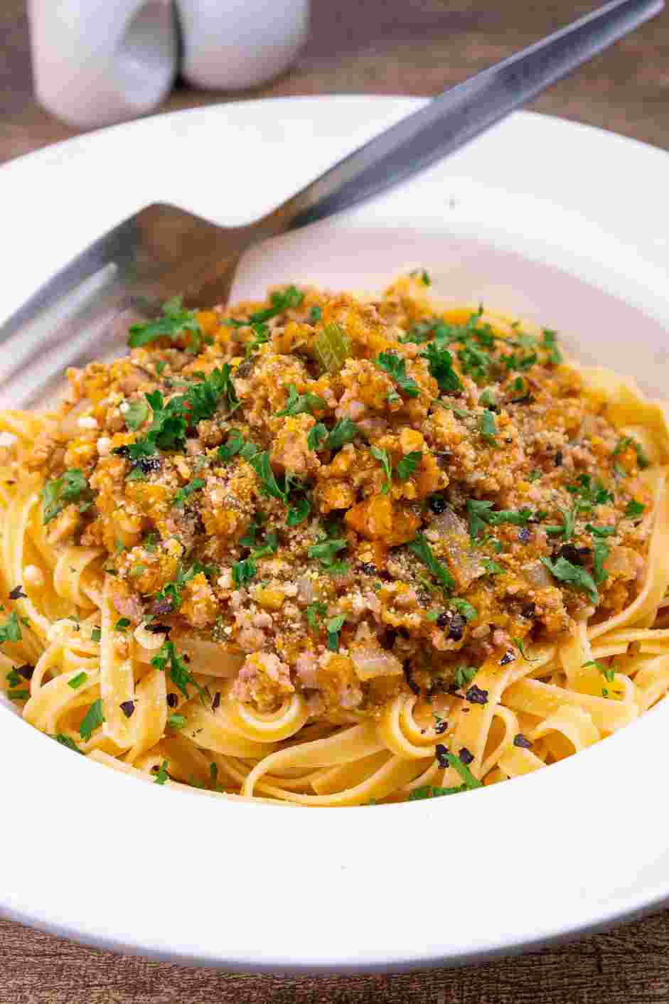 Turkey Bolognese Recipe: Top the pasta with the desired amount of meat sauce and garnish with Parmesan cheese, parsley and/or red pepper flakes, if desired.