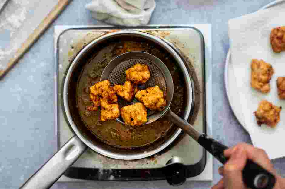 Vegan Fried Chicken Recipe: Fry three to four pieces of tofu at a time for 4-5 minutes or until golden brown.