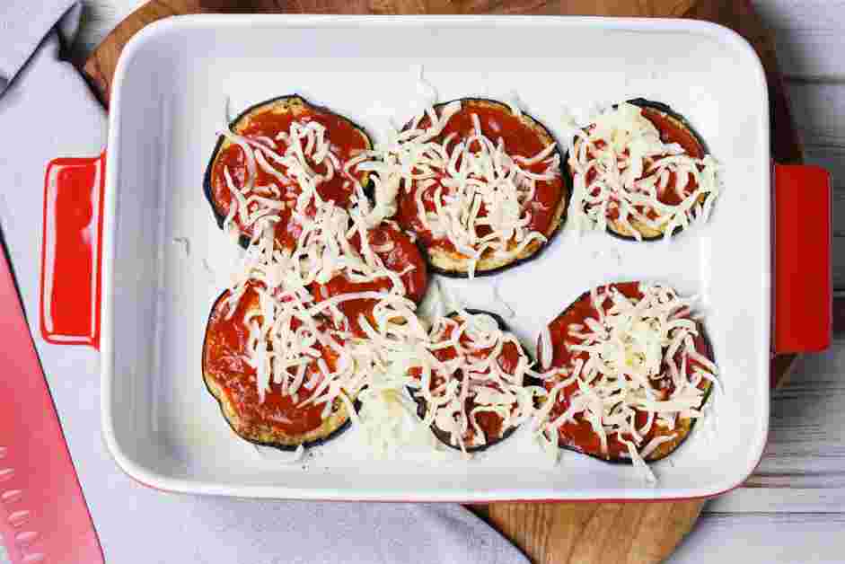 Eggplant Casserole Recipe: Spread half of the marinara sauce on top and sprinkle with half of the shredded mozzarella.