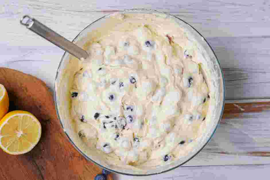 Lemon Blueberry Pound Cake Recipe: Fold in the dusted blueberries into the lemon poundcake mixture.