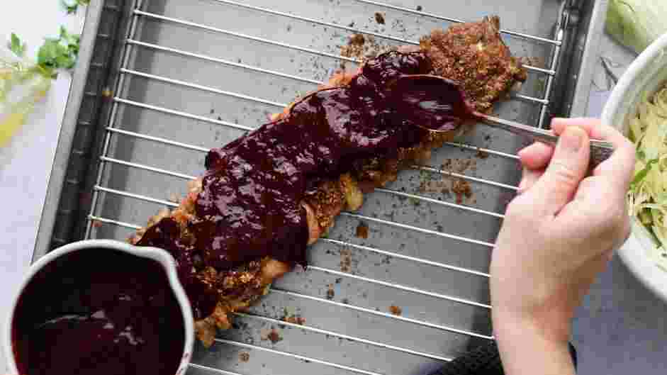 Smoked Baby Back Ribs with Blueberry BBQ Sauce Recipe: After the ribs are done smoking, remove the ribs from the smoker and preheat the oven to 300&deg;F.