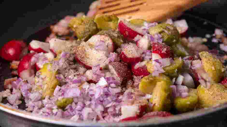 Cowboy Steak with Pan-Fried Radish and Bacon Recipe: Add in the radishes, Brussels sprouts, minced shallot and pepper.