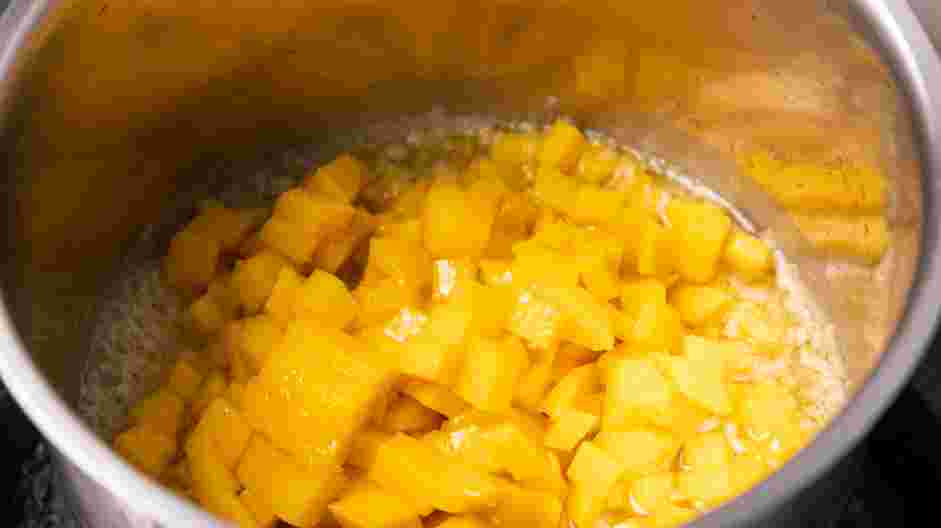 Mango Habanero Wings Recipe: Add the mangos and sauté for another 2-3 minutes.
