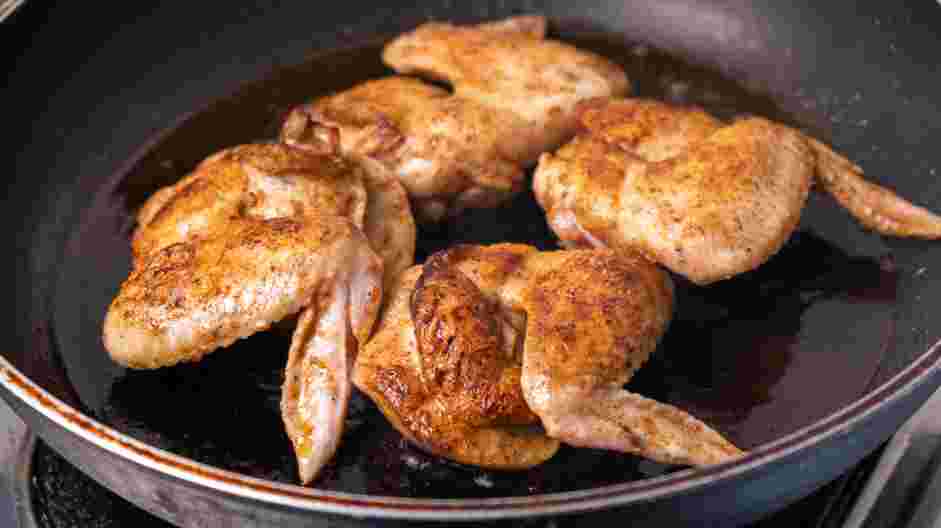 Mango Habanero Wings Recipe: Heat a cast-iron skillet.