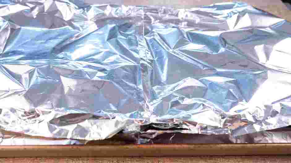 Rib Tips Recipe: Cover the sheet pan with aluminum foil and pinch the sides to create a seal.