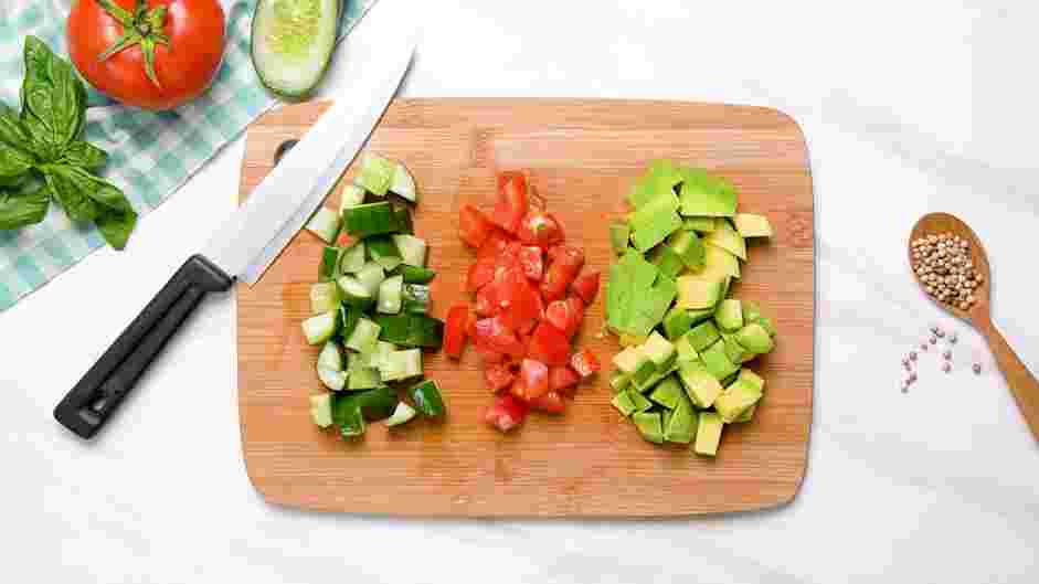 Cucumber Tomato Avocado Salad Recipe: Prepare the vegetables.