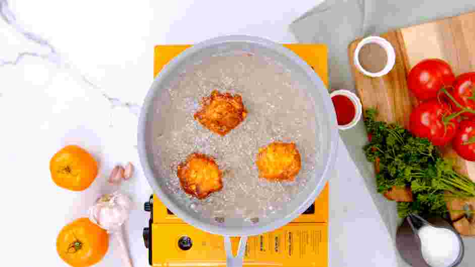 Corn Nuggets Recipe: Use a spoon or a small disher to drop about two tablespoons of batter into the hot oil.