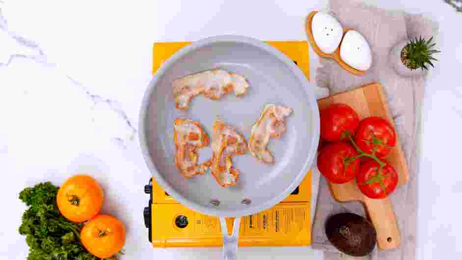 Tomato Gravy Recipe: In a large skillet on low heat, cook the bacon until crispy and cooked through.