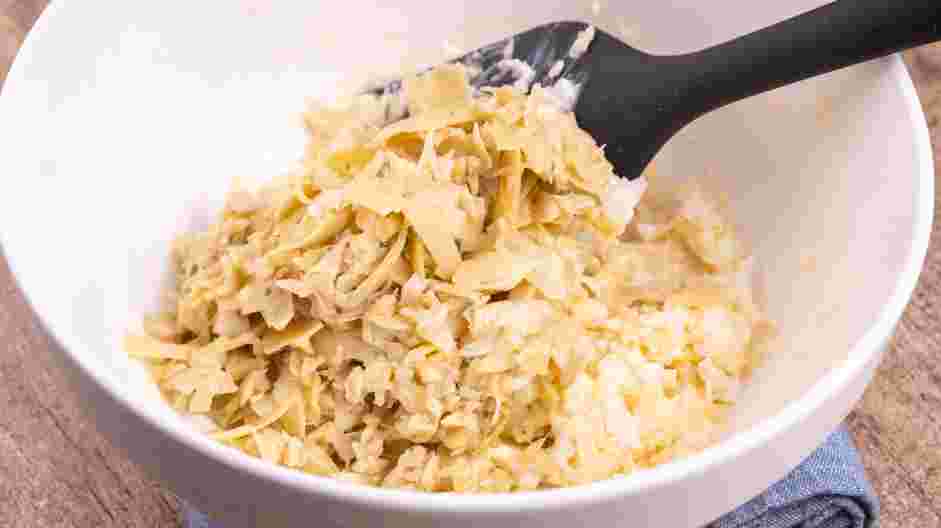 Hot Artichoke Dip Recipe: Transfer the chopped artichokes to the mayonnaise mixture.