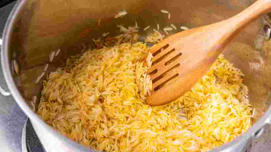 Chicken and Yellow Rice Recipe: Remove the chicken from the skillet.