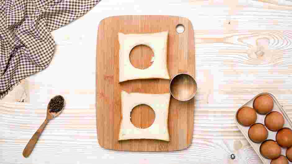 Egg in a Hole Recipe: Use a round pastry cutter or the mouth of a mason jar to cut out the center of each slice of bread.