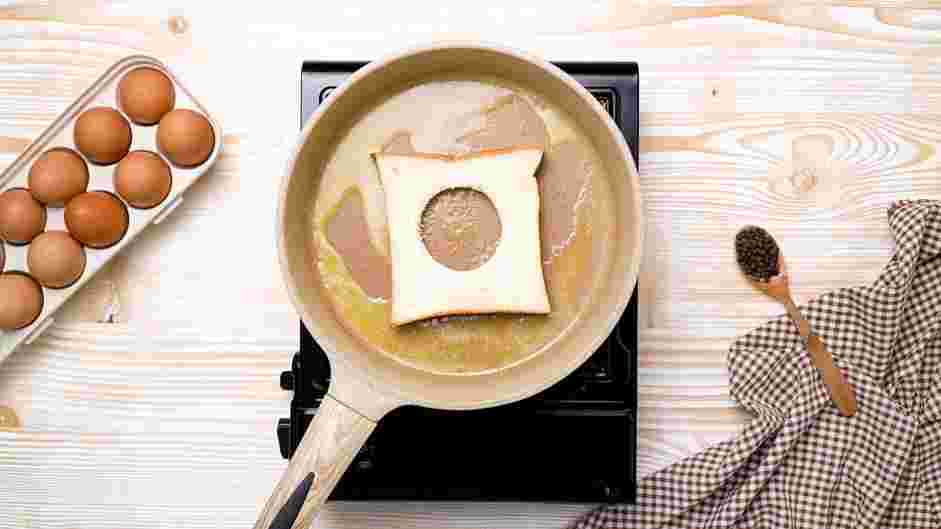 Egg in a Hole Recipe: In a nonstick skillet over medium-low heat, melt 1½ tablespoons butter.