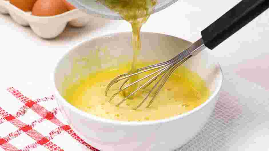 Lime Curd Recipe: Slowly temper the hot lime juice mixture into the egg yolk mixture by drizzling it into the yolk mixture very slowly and whisking vigorously.