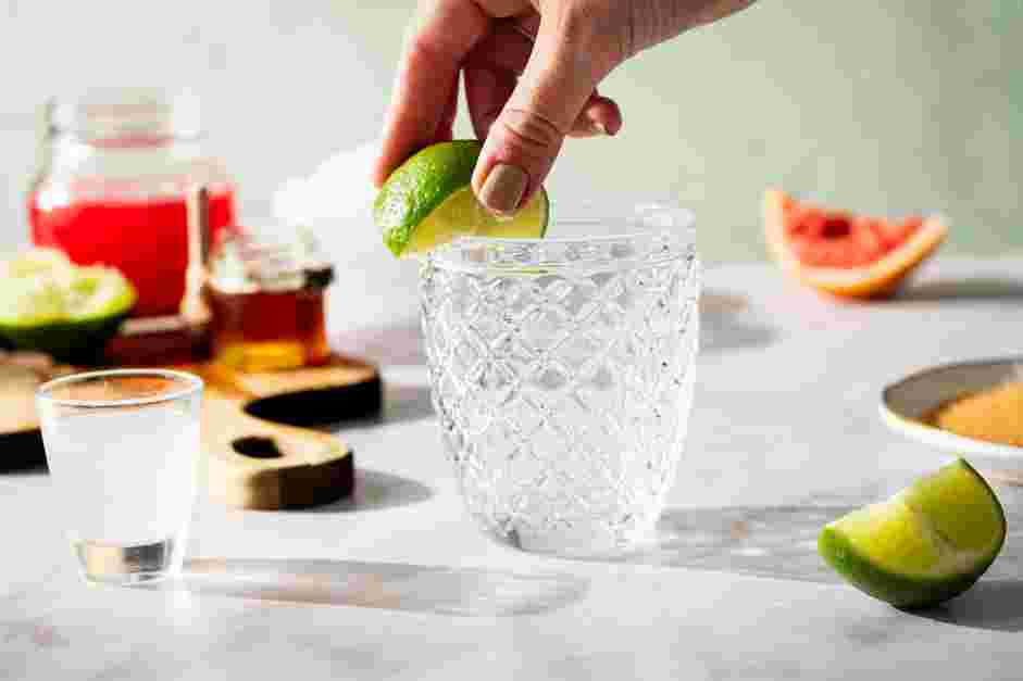 Blood Orange Margarita Recipe: Run a lime wedge through the rim of the cup.