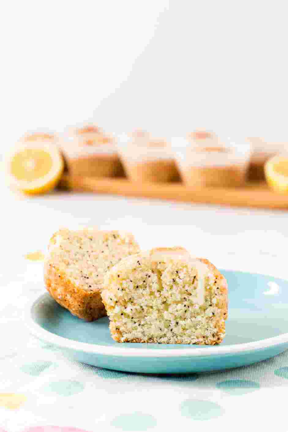 Lemon Poppy Seed Muffins Recipe: Drizzle the lemon glaze over the cooled muffins and serve.