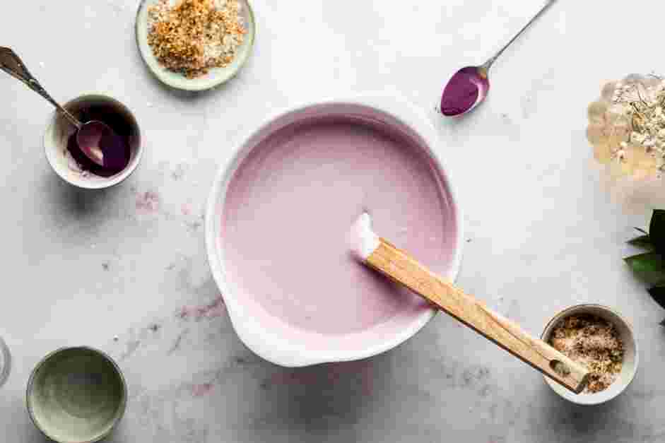 Ube Ice Cream Recipe: Add one-third of the whipped cream to the condensed milk mixture and fold until combined.