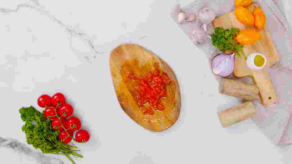 Tomato Basil Pasta Recipe: Once the tomato is cool, remove the tomato from the ice water and peel each tomato.