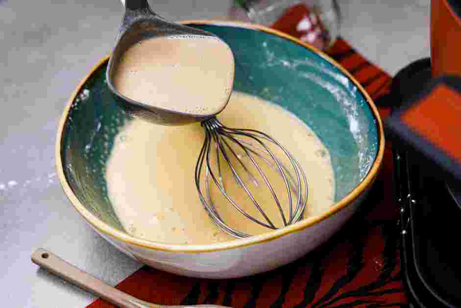 Budino Recipe: Whisk in half of the hot milk mixture into the cornstarch mixture, a ladleful at a time, making sure to continuously whisk to avoid lumps.