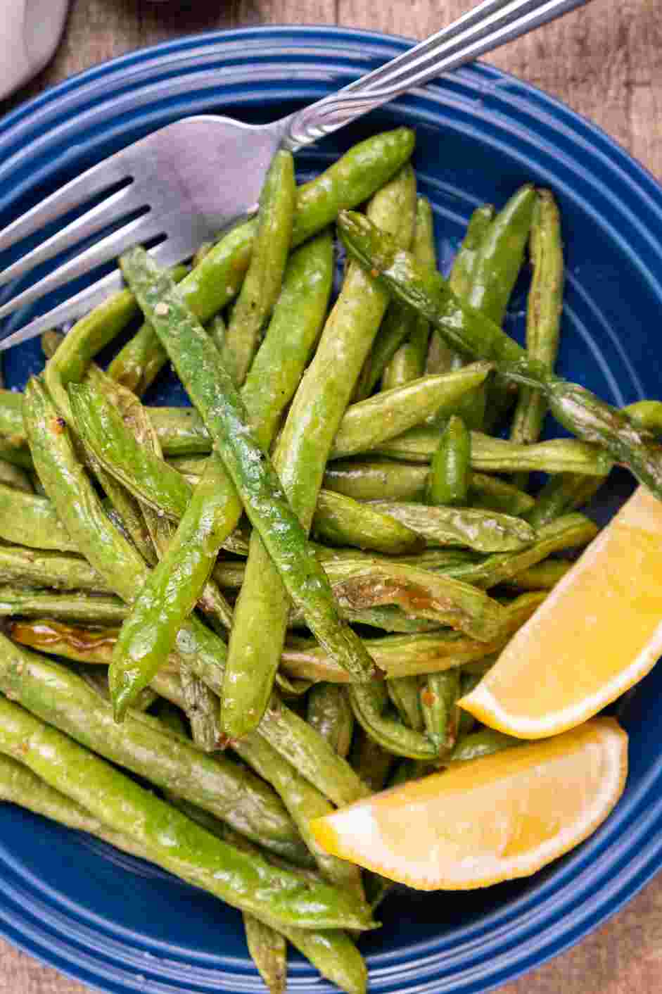 Air Fryer Green Beans Recipe: Air fry the green beans for another 3-5 minutes, or until crisp tender.